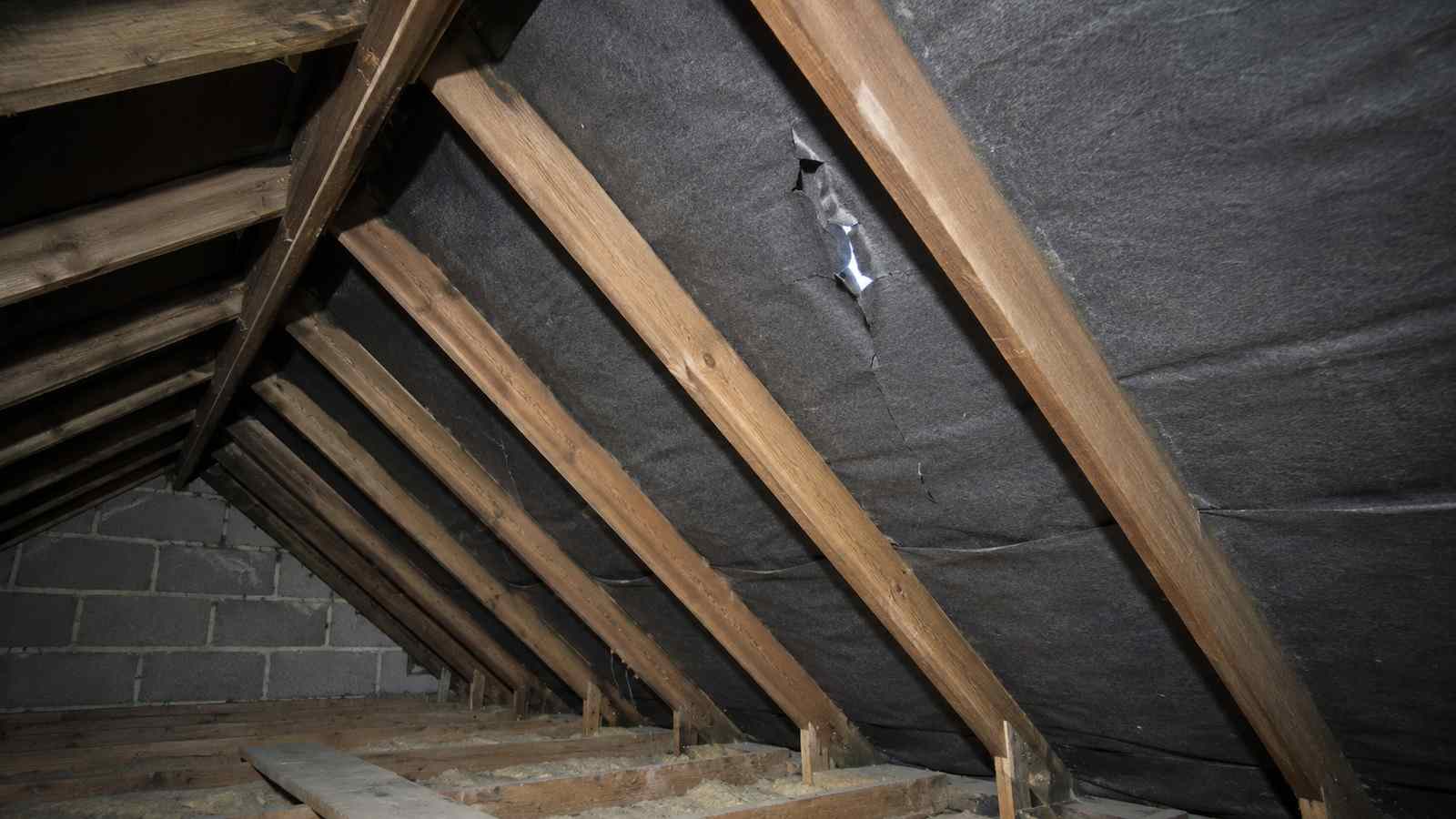 Rotting Timbers Beside a Chimney Breast — illustrative timber damage or inspection photograph